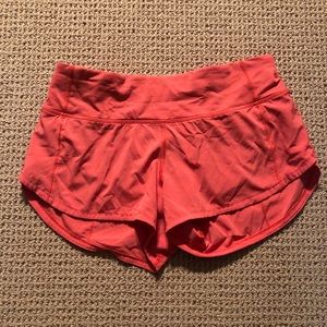 Orange lululemon shorts